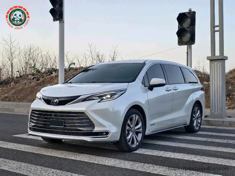 White Toyota Sienna photographed outdoors